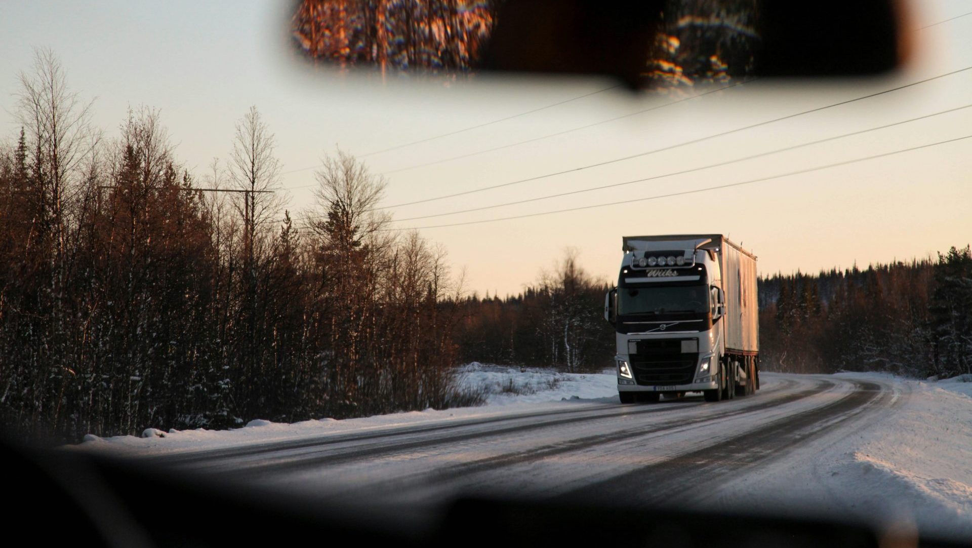 gray cargo truck on road during daytime