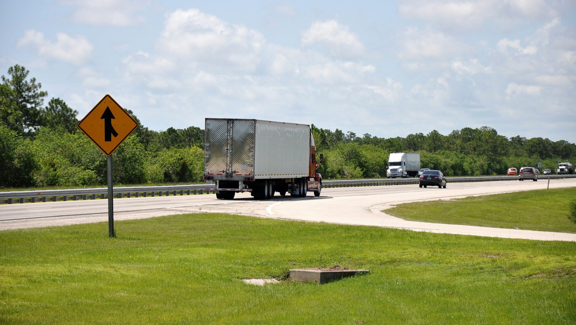 a truck driving down the road